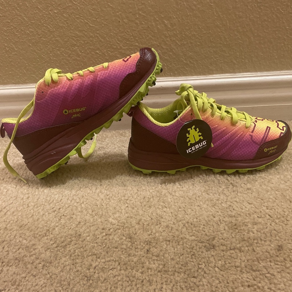 Icebug Women’s running shoes with carbide studs.